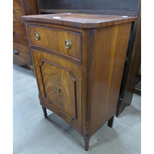 146 - A Bevan Funnel mahogany concave side cabinet