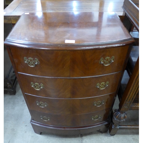 147 - A George III style mahogany bow front chest of drawers