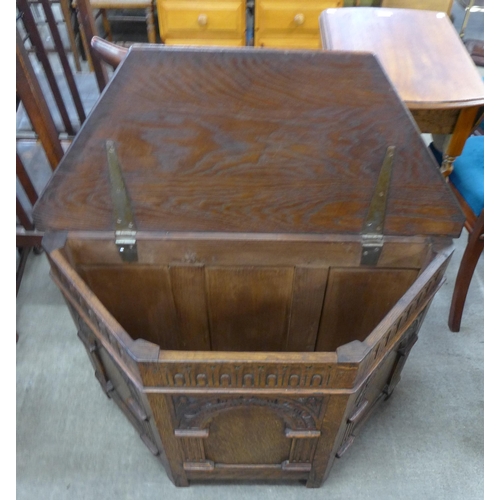 150 - A 17th Century style carved oak blanket box