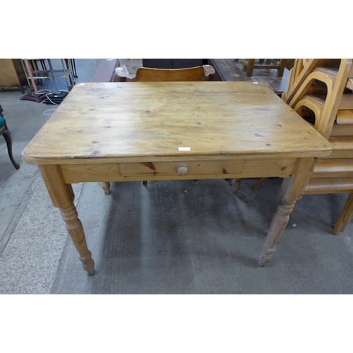 153 - A Victorian style pine single drawer kitchen table