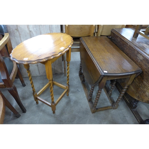 166 - An oak gateleg table and an occasional table