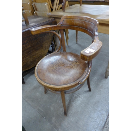 170 - An early 20th Century beech bentwood elbow chair