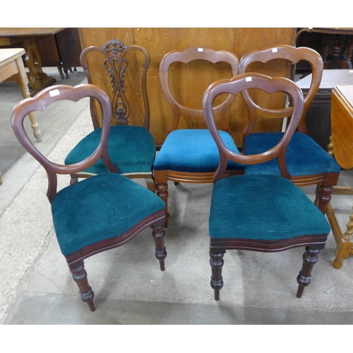 173 - A set of four Victorian mahogany balloon back dining chairs and one other