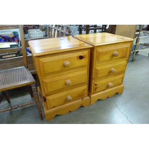 187 - A pair of pine bedside chests