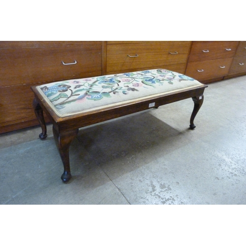 194 - An early 20th Century oak stool