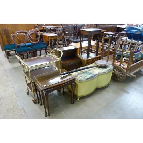 201 - A mahogany nest of two tables, occasional table, trolley, ottoman, mahogany bedside table, etc.