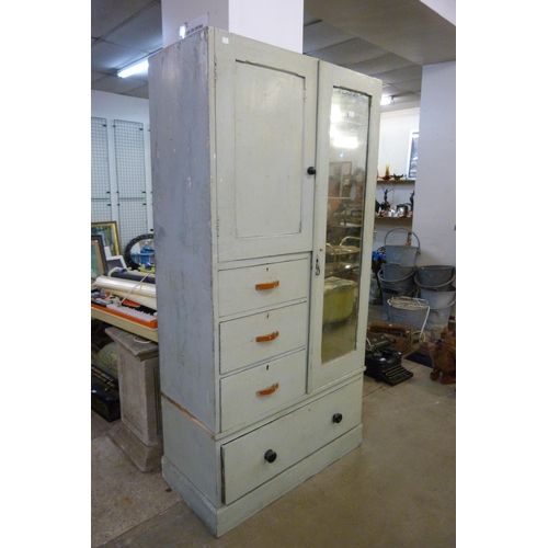 215 - A Victorian painted pine wardrobe