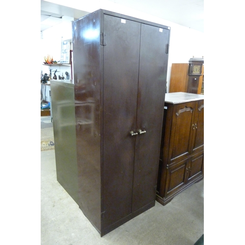 219 - An industrial brown metal two door locker