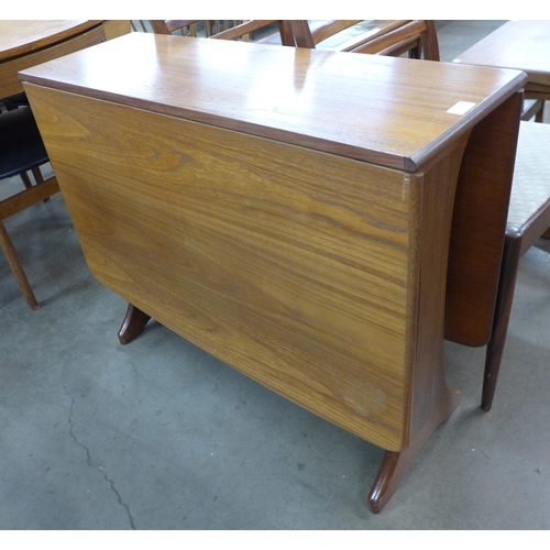 22 - A G-Plan Fresco teak drop-leaf table and four chairs