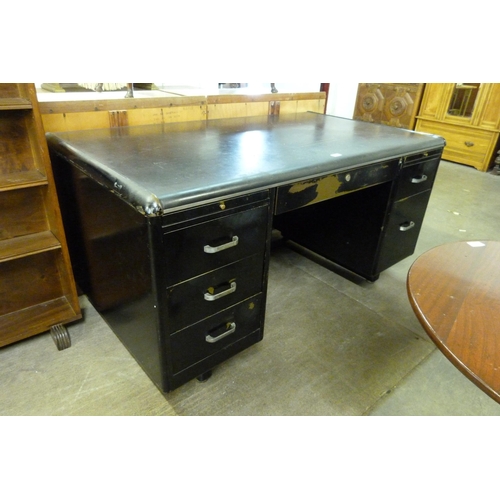 220 - An industrial black metal desk