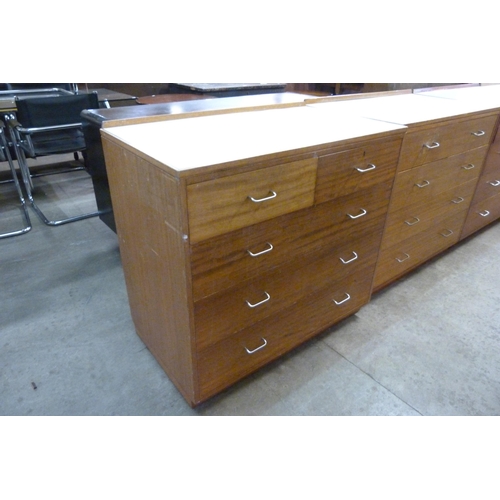 221 - A mid 20th Century teak and Formica topped M.O.D. chest of drawers