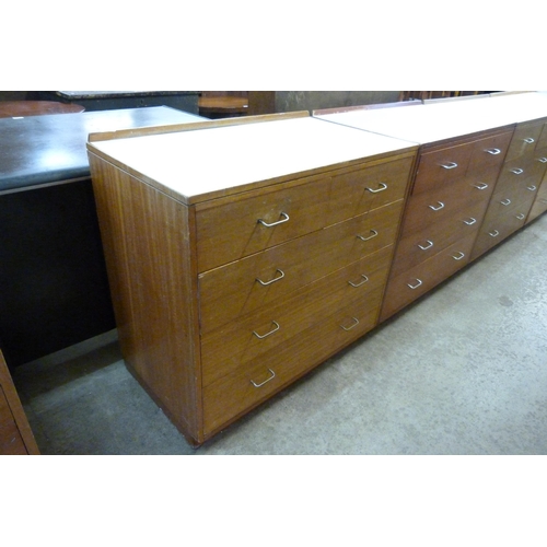 222 - A mid 20th Century teak and Formica topped M.O.D. chest of drawers