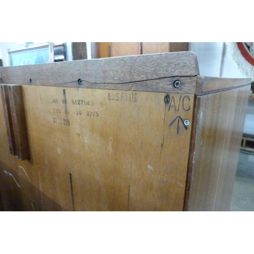 222 - A mid 20th Century teak and Formica topped M.O.D. chest of drawers