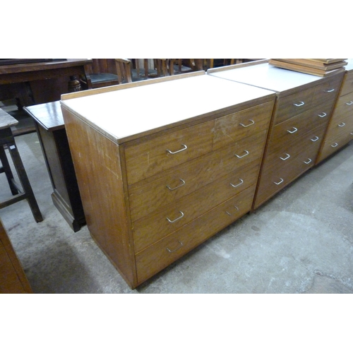 225 - A mid 20th Century teak and Formica topped M.O.D. chest of drawers