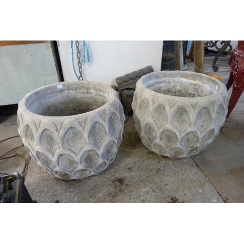 233 - A pair of concrete garden planters