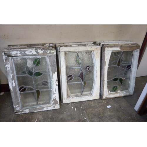 238B - Twelve Art Nouveau stained glass windows and a window pane