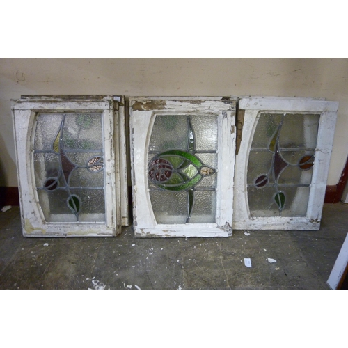 238B - Twelve Art Nouveau stained glass windows and a window pane