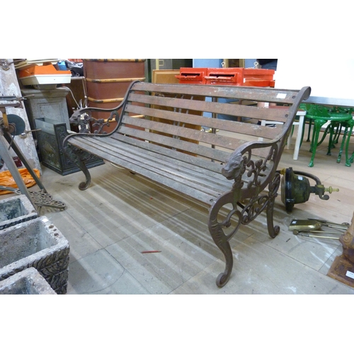 265 - A cast iron ended garden bench