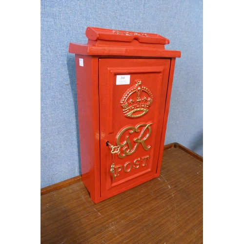 268 - A red metal Post Office letter box, with key