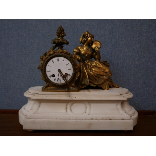 307 - A 19th Century French gilt metal and white marble mantel clock