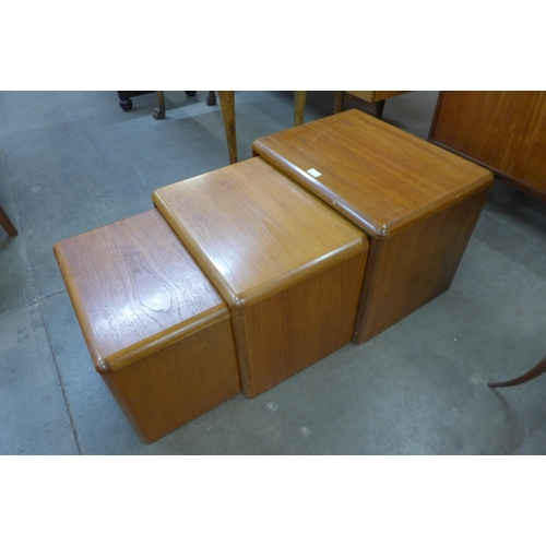 31 - A teak nest of tables