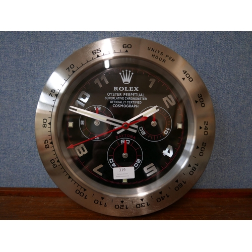 319 - A Rolex style dealer's display wall clock