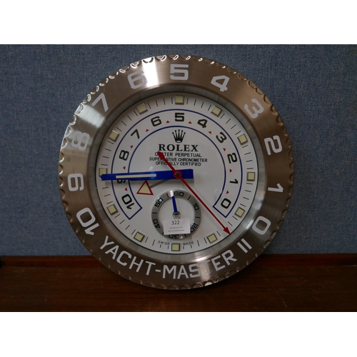 322 - A Rolex style dealer's display wall clock