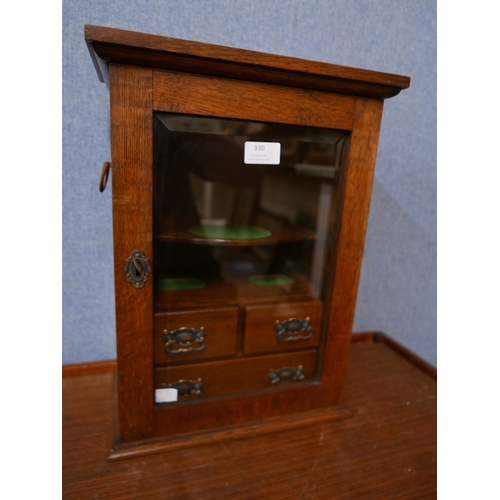 330 - An Edward VII oak smoker's cabinet