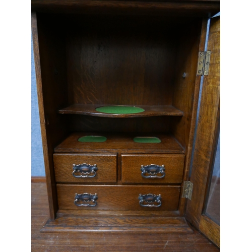 330 - An Edward VII oak smoker's cabinet