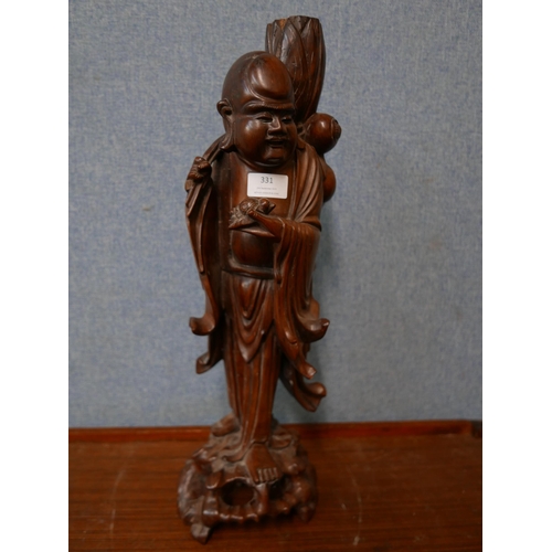 331 - An oriental carved hardwood figural Buddha lamp base