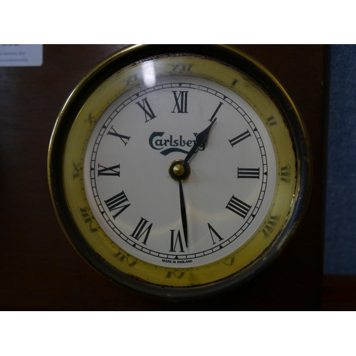 332 - A wall mounted ships style brass clock and barometer, marked Carlsberg