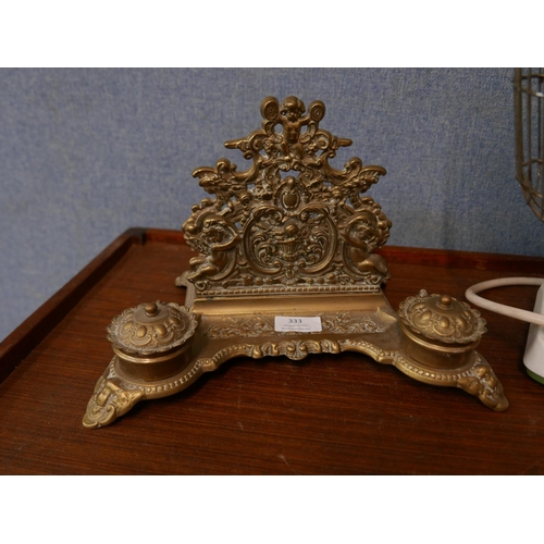 333 - A vintage Xpelair Taurus desk fan and a brass desk stand