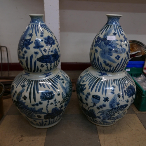 342 - A pair of large Chinese blue and white porcelain double gourd shaped vases