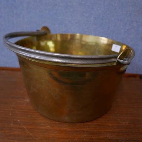 343 - A Victorian brass jam pan