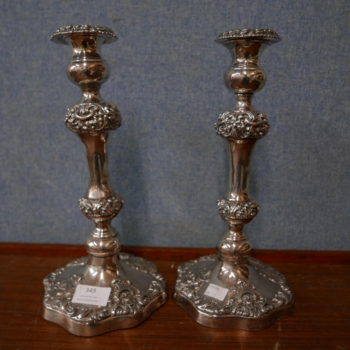 349 - A pair of Sheffield plated candlesticks