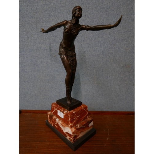 355 - An Art Deco style bronze figure of an exotic dancer, on rouge marble socle