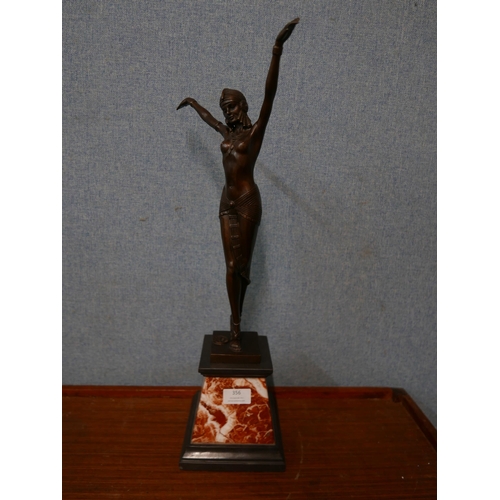 356 - An Art Deco style bronze figure of an exotic female dancer, on rouge marble socle