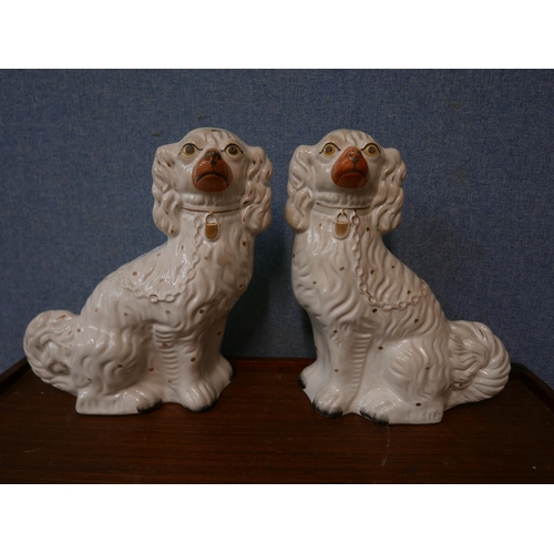 362 - A pair of 19th Century Staffordshire flatback spaniels