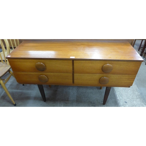 43 - A teak four drawer sideboard