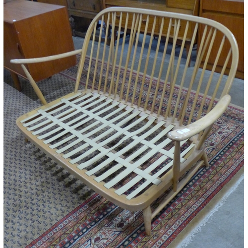 46 - An Ercol Blonde beech Windsor settee