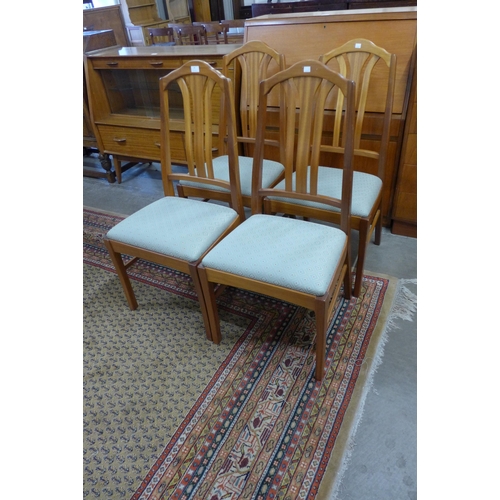 50 - A set of four Parker Knoll teak dining chairs