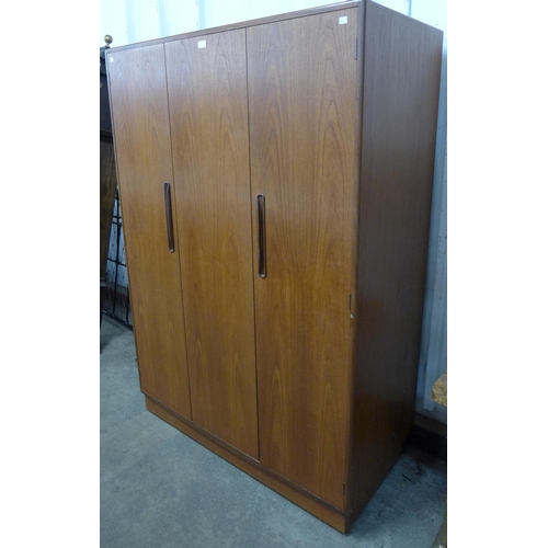 67 - A G-Plan Fresco teak three door wardrobe