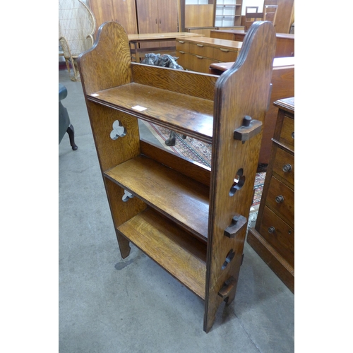 78 - An Arts and Crafts oak open bookcase