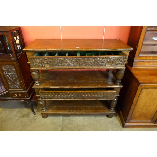 90 - A Charles II Welsh carved oak three tier buffet