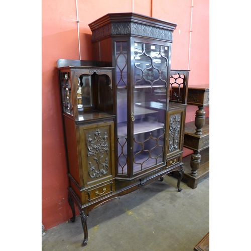 91 - An Edward VII carved mahogany side cabinet