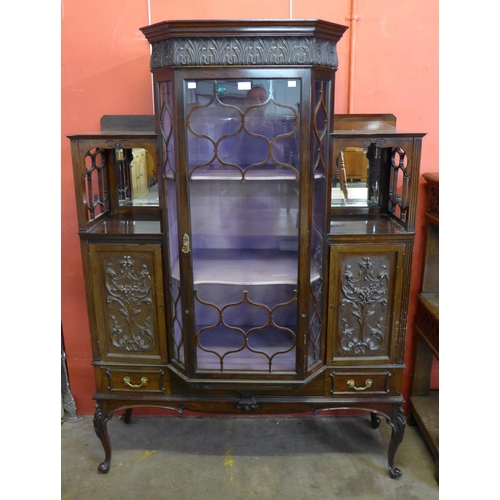 91 - An Edward VII carved mahogany side cabinet