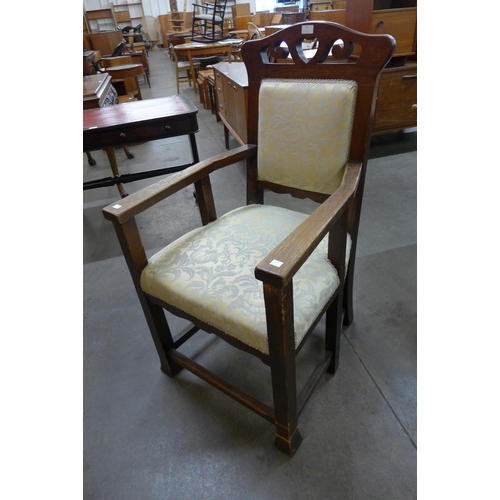 95 - An Arts and Crafts Heals style oak armchair, manner of Ambrose Heal