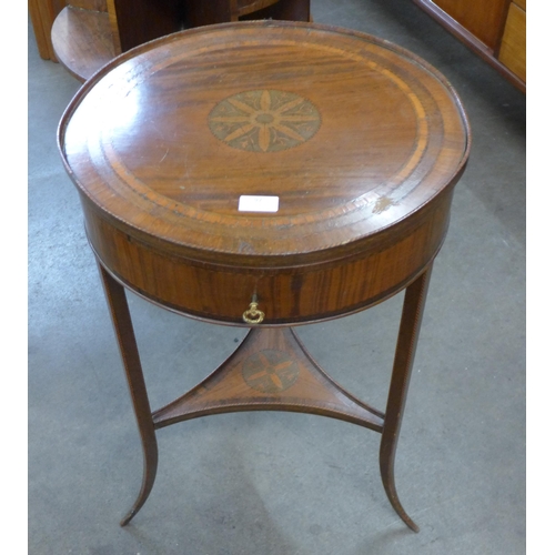 97 - A 19th Century French inlaid mahogany circular lady's sewing table