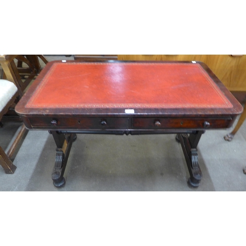 98 - A William IV mahogany and red leather topped two drawer writing table