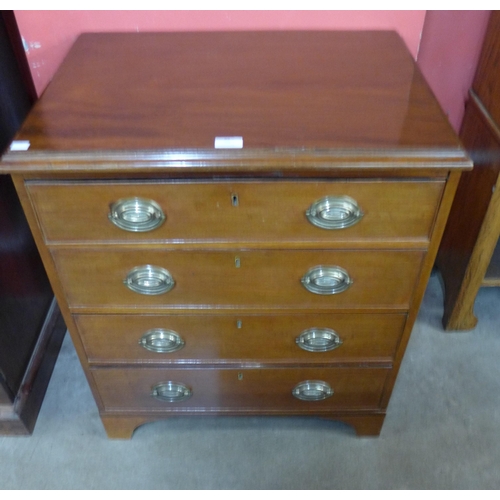 99 - A George III style mahogany bachelors chest of drawers